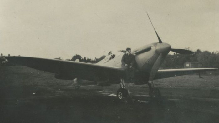 Gunn with a Spitfire. Courtesy of the Gunn family.