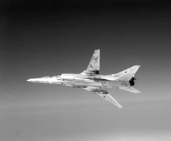 A left underside view of a Soviet Tu-22M Backfire-B bomber aircraft in flight.