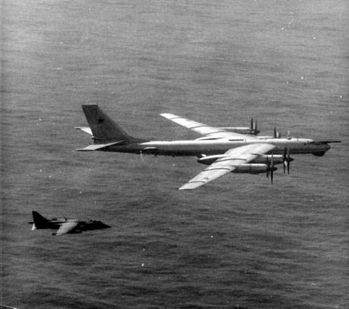 A U.S. Marine Corps Hawker Siddley AV-8A Harrier of Marine attack squadron VMA-231 Ace of Spades intercepting a Soviet Tupolev Tu-95 in 1976/77.