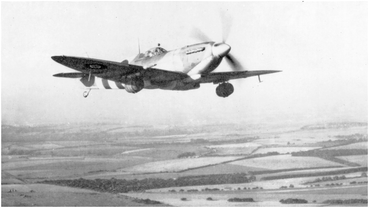 Spitfire carrying beer barrels.